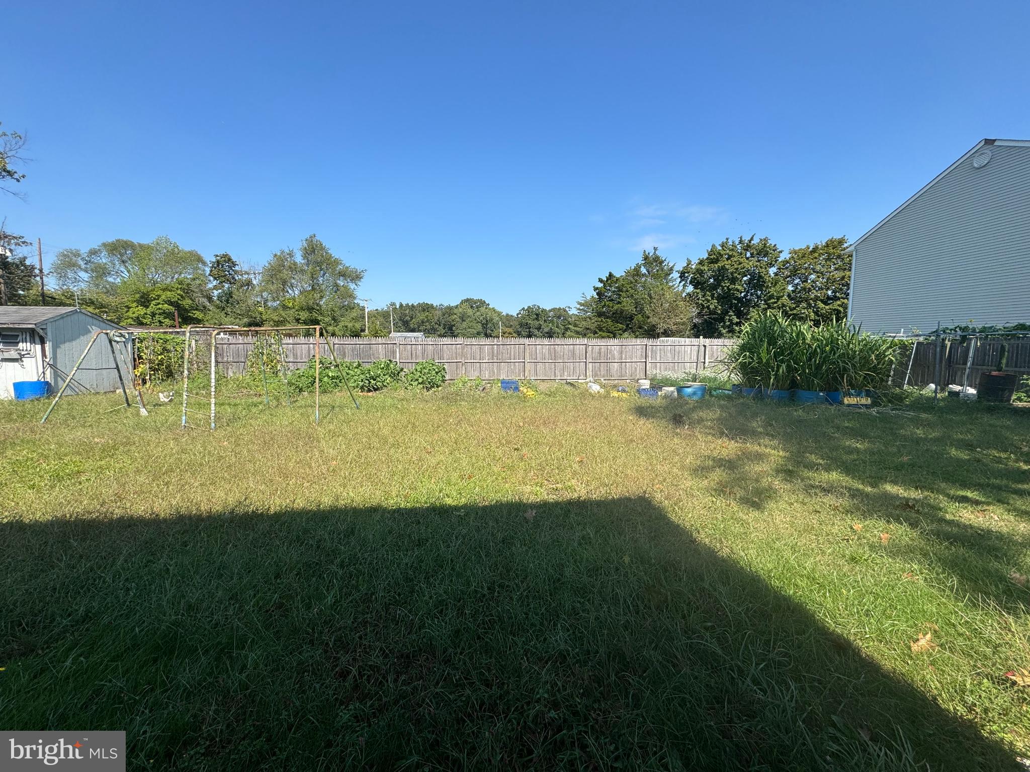 26 Nicholas Street Pemberton, NJ 08068 - Photo 7 of 7 a view of a lake with houses in the back