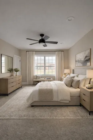 a spacious bedroom with a bed a couch and a window