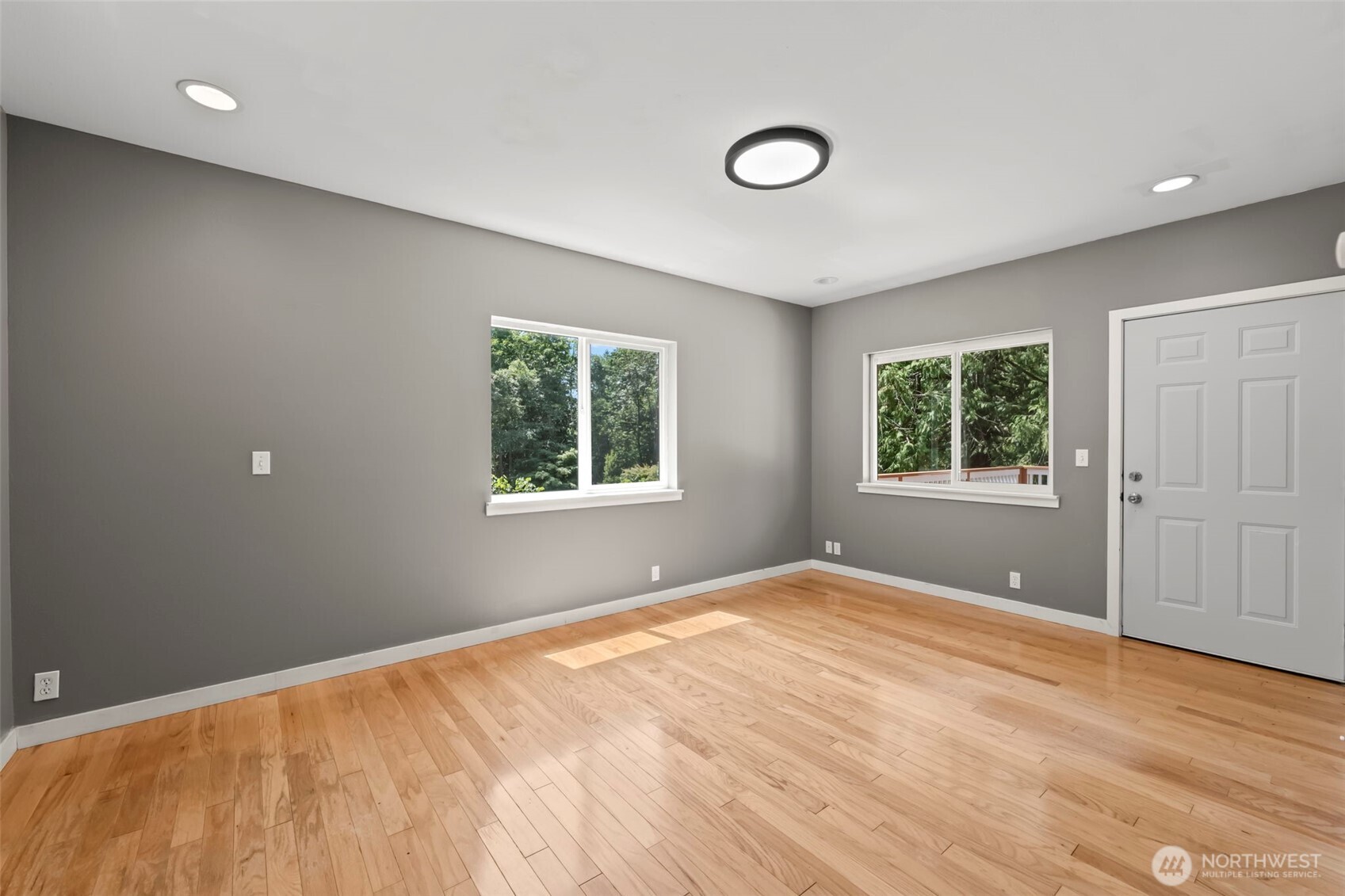 12170 Viewcrest Place Northeast Bainbridge Island, WA 98110 - Photo 17 of 37 a view of empty room with window