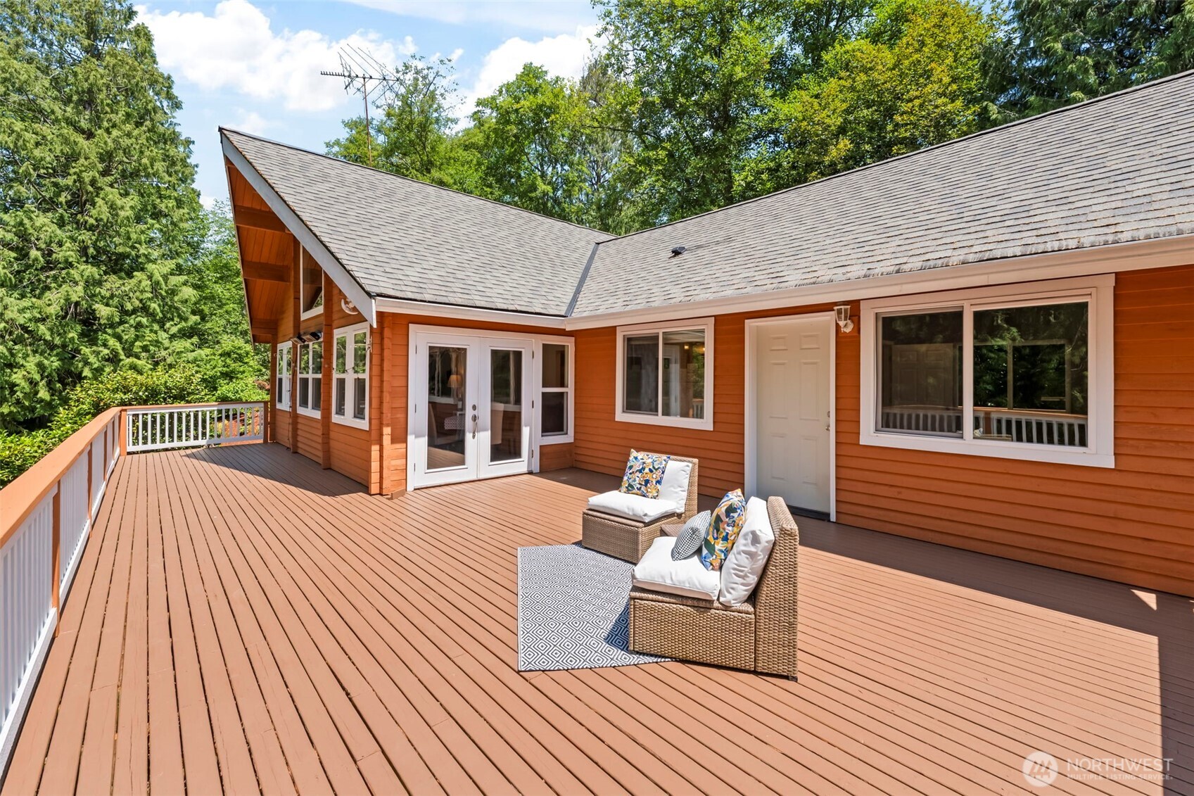 12170 Viewcrest Place Northeast Bainbridge Island, WA 98110 - Photo 10 of 37 a backyard of a house with seating space