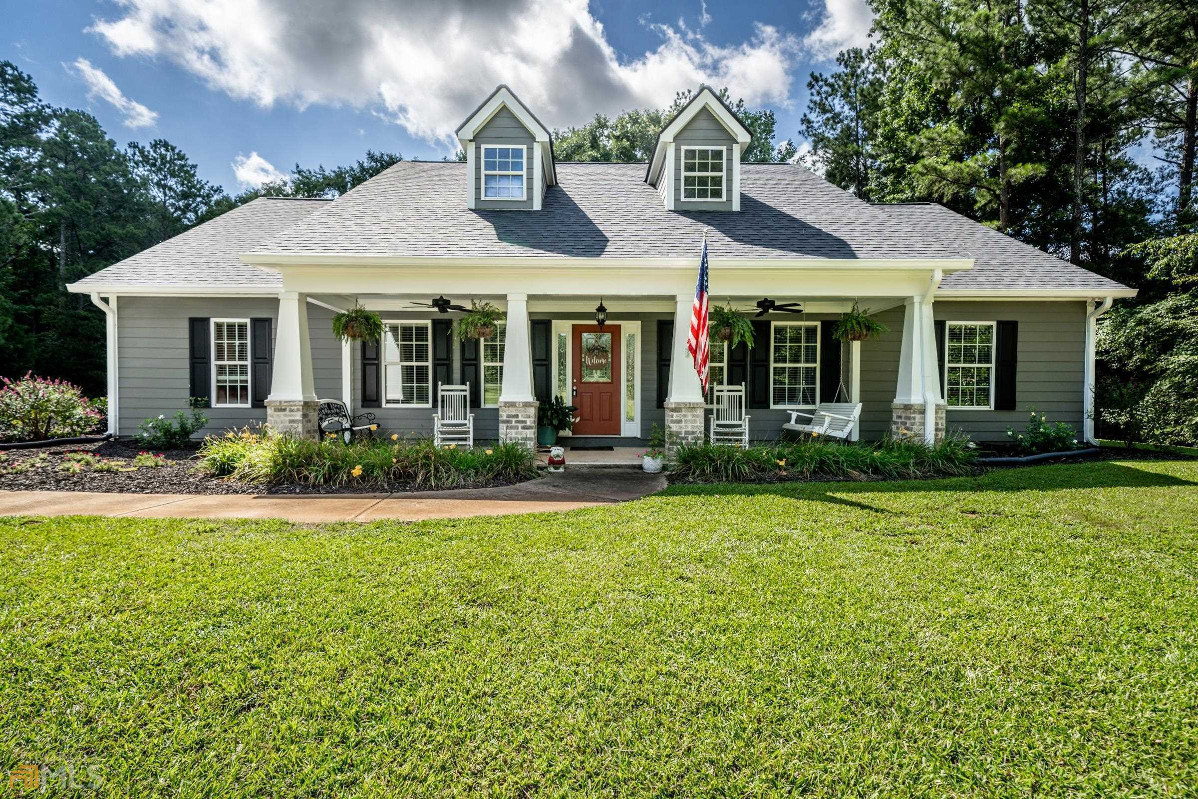 3081 Old Mill Road Rutledge, GA 30663 - Photo 1 of 1 a front view of a house with garden