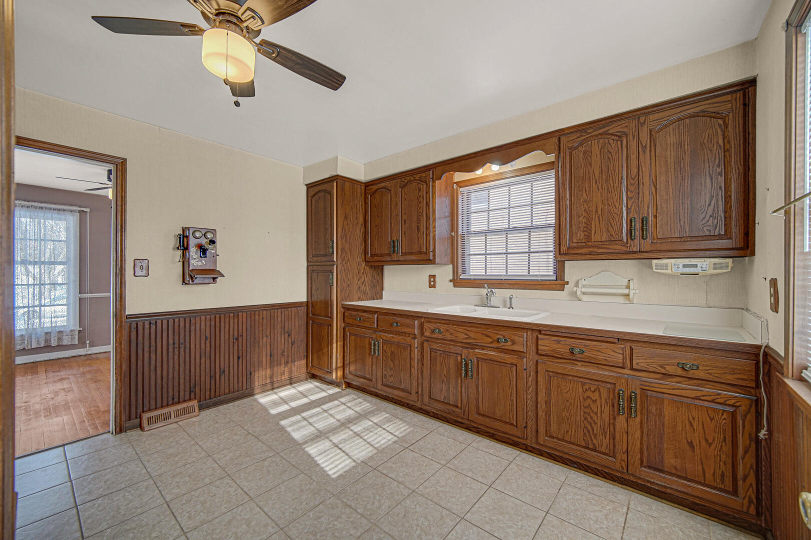 248 Adelaide Place Munster, IN 46321 - Photo 13 of 28 a kitchen with a sink cabinets and window