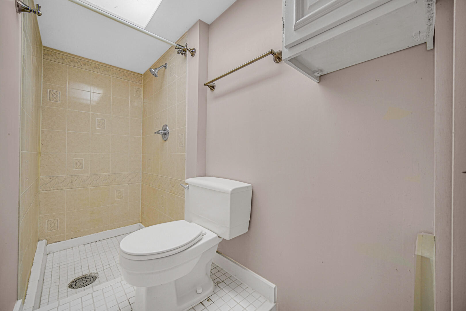 248 Adelaide Place Munster, IN 46321 - Photo 23 of 28 a white toilet sitting next to a shower curtain