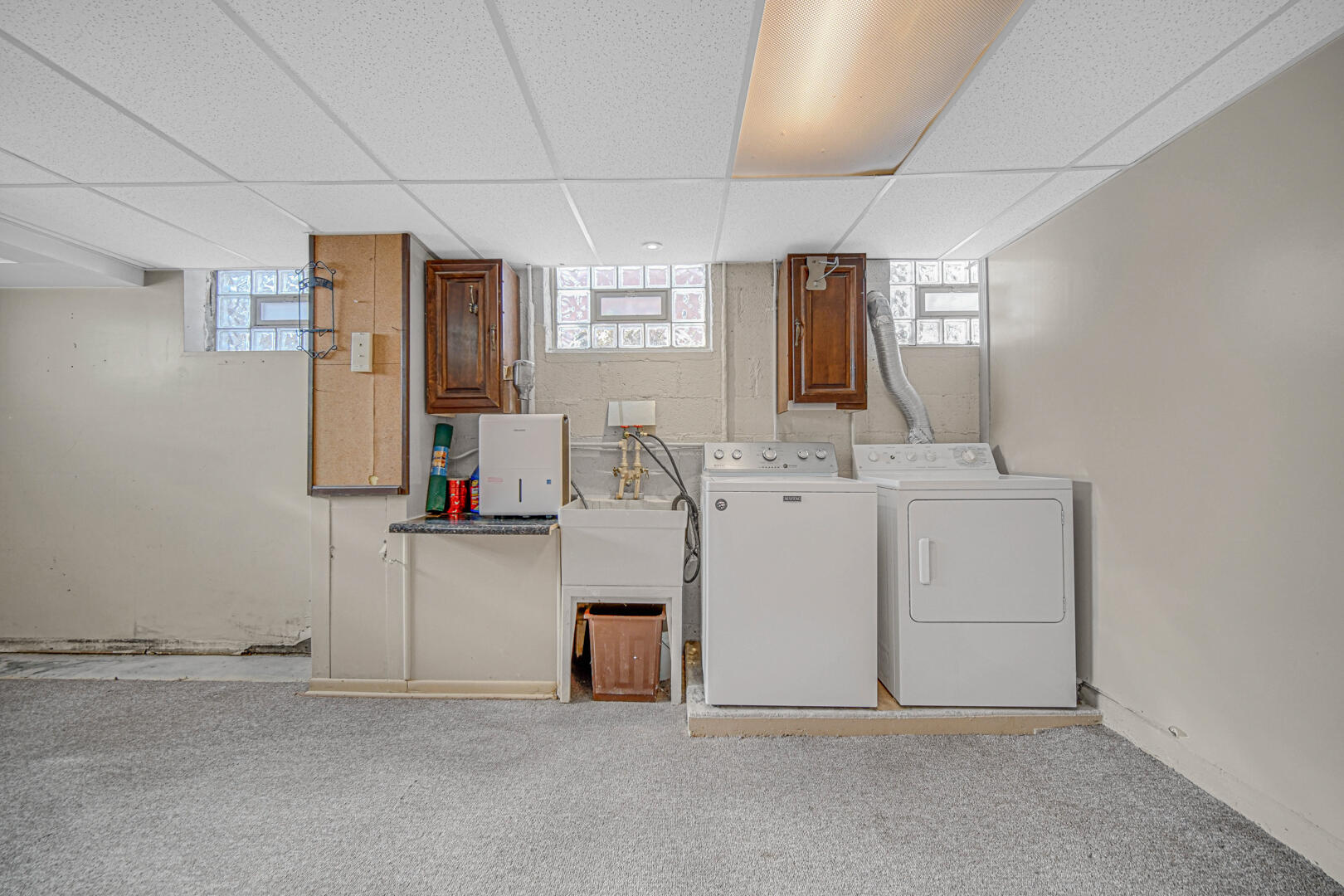 248 Adelaide Place Munster, IN 46321 - Photo 24 of 28 a bathroom with a sink and a mirror