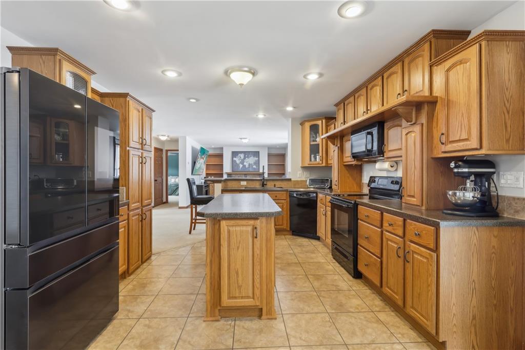 224 Toy Road Kittanning, PA 16201 - Photo 14 of 48 a kitchen with stainless steel appliances granite countertop a refrigerator stove and oven