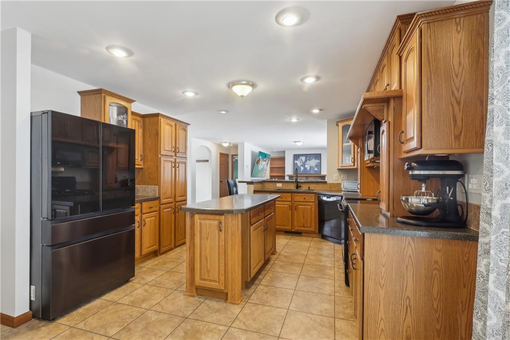 224 Toy Road Kittanning, PA 16201 - Photo 15 of 48 a kitchen with stainless steel appliances granite countertop a refrigerator and a stove top oven