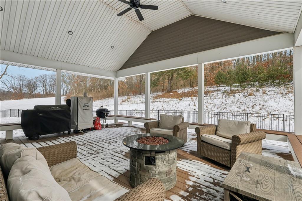 224 Toy Road Kittanning, PA 16201 - Photo 36 of 48 a living room with furniture large windows and wooden floor