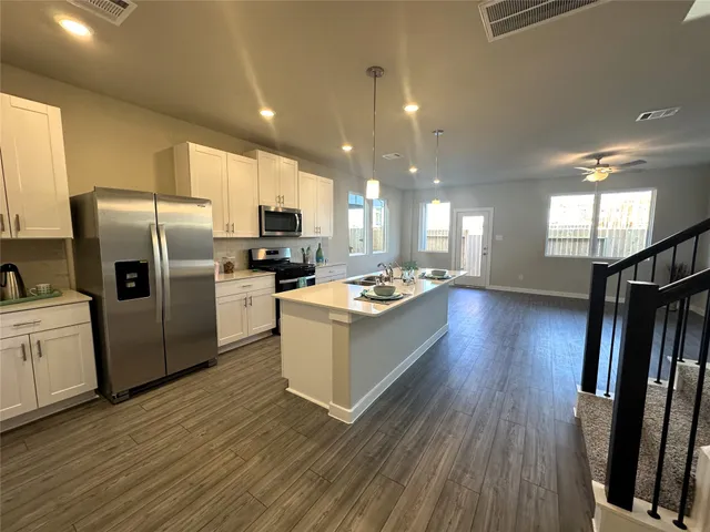 an empty room with closet area