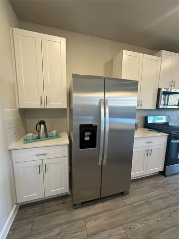 a view of a room with an empty space