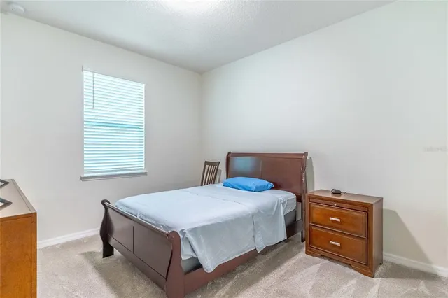 a bathroom with a sink toilet and vanity