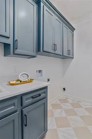 a spacious bathroom with a double vanity sink a mirror and a shower