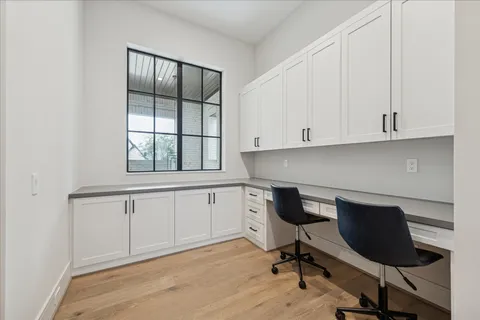 a bedroom with a bed and a stove top oven