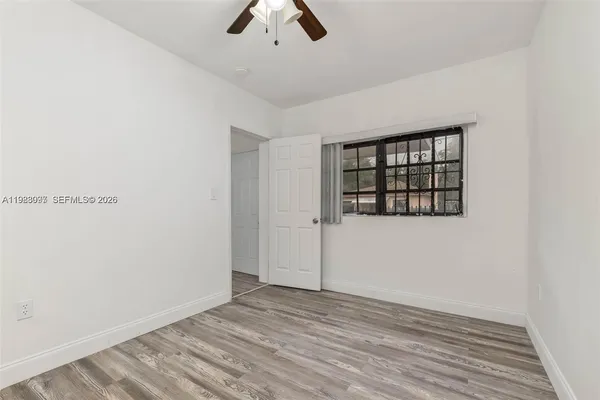 an empty room with windows