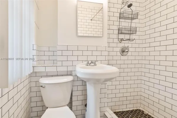 a bathroom with a sink and a toilet