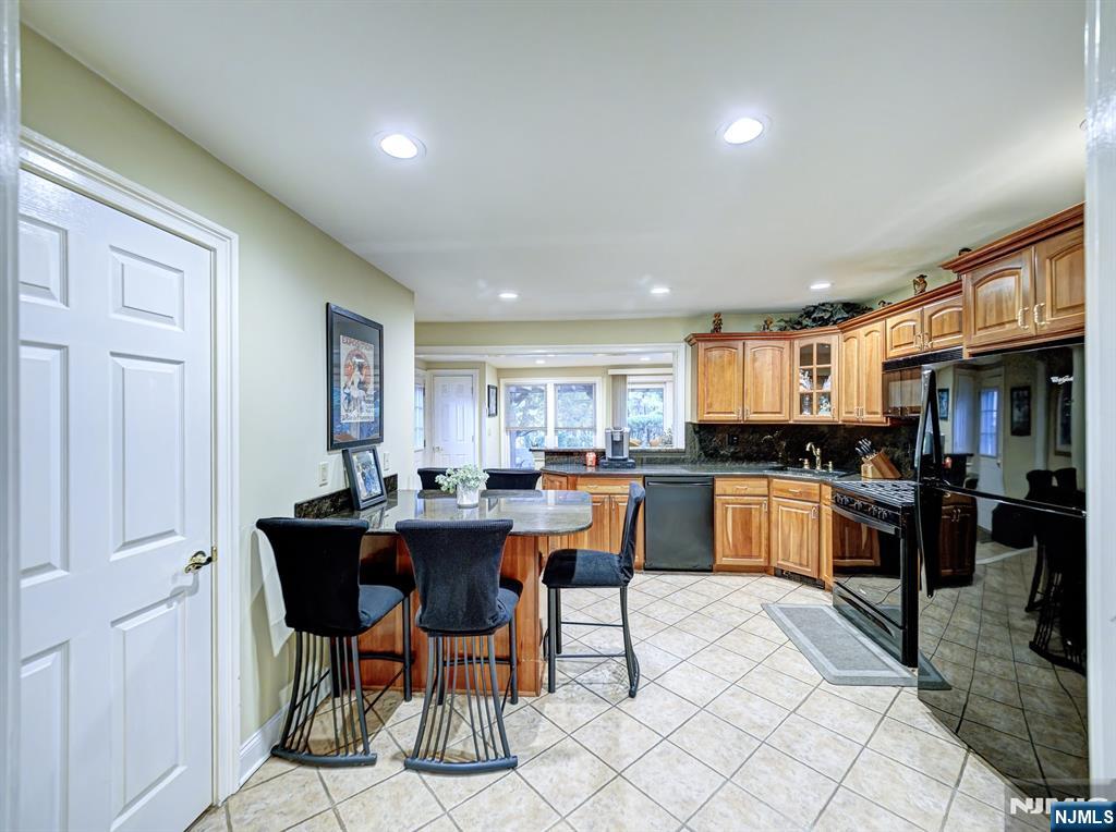 59 David Road Cedar Grove, NJ 07009 - Photo 5 of 24 a view of a dining room with furniture