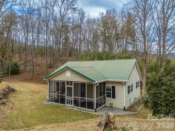 a house with trees in the background