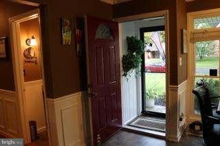 7410 Inzer Street Springfield, VA 22151 - Photo 20 of 30 a view of a door and chair in a room