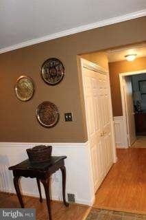 7410 Inzer Street Springfield, VA 22151 - Photo 23 of 30 a view of a hallway with seating area
