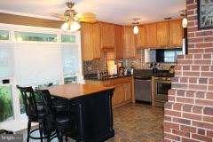7410 Inzer Street Springfield, VA 22151 - Photo 24 of 30 a kitchen with a sink and cabinets