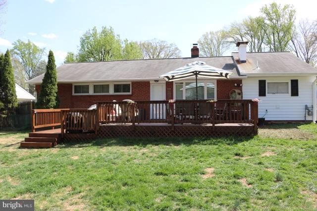 7410 Inzer Street Springfield, VA 22151 - Photo 8 of 30 a front view of house with yard barbeque oven and green space