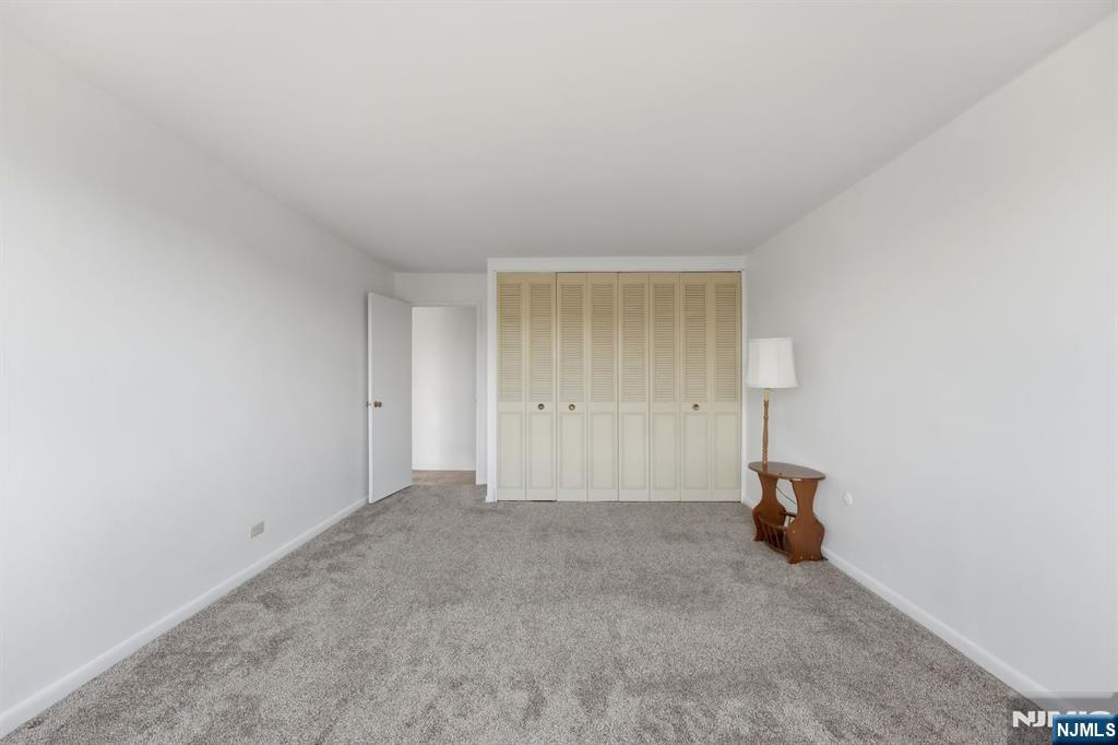 265 Main Street, Unit 704 Ridgefield Park, NJ 07660 - Photo 15 of 23 an empty room with a window