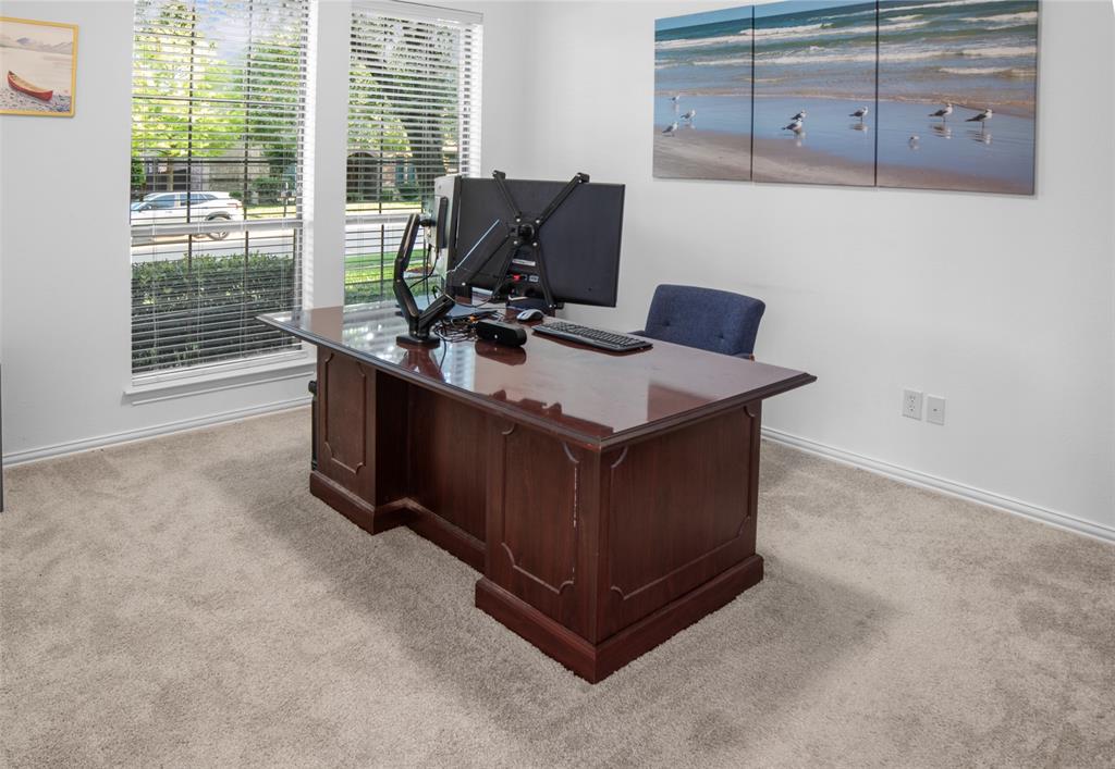 1818 Port Isabel Drive Allen, TX 75013 - Photo 14 of 38 a view of a kitchen with furniture and large windows