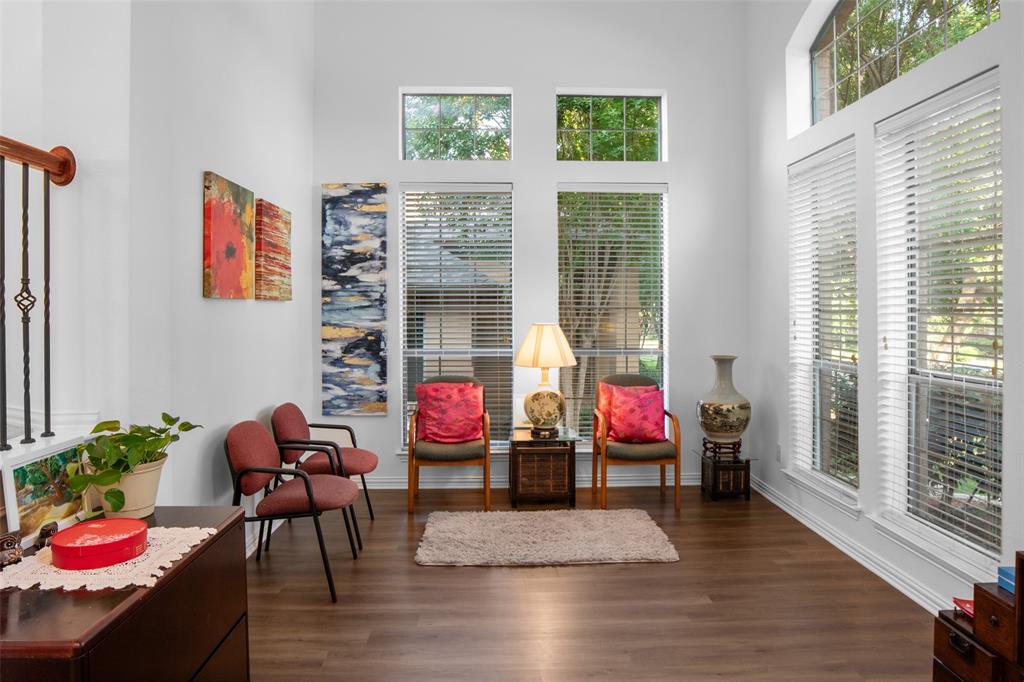 1818 Port Isabel Drive Allen, TX 75013 - Photo 2 of 38 a living room with furniture and wooden floor