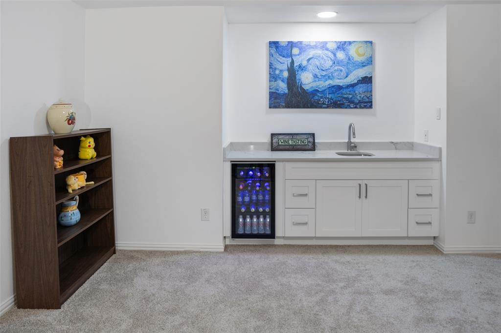 1818 Port Isabel Drive Allen, TX 75013 - Photo 29 of 38 a workspace with furniture and closet