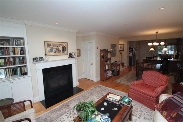 49 Intrepid Circle, Unit 49 Marblehead, MA 01945 - Photo 6 of 12 a living room with furniture and a fireplace