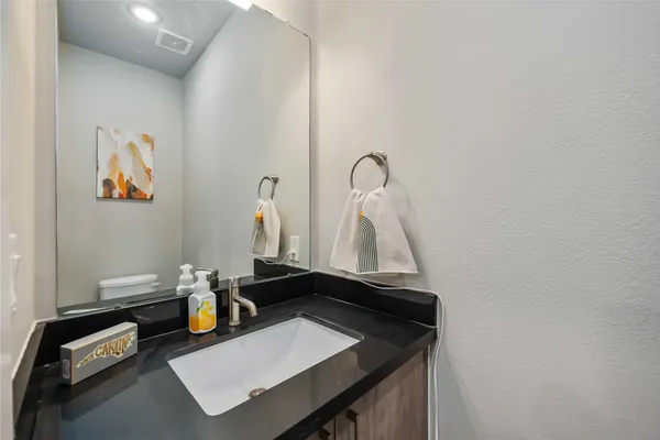 a view of a room with bed and toys