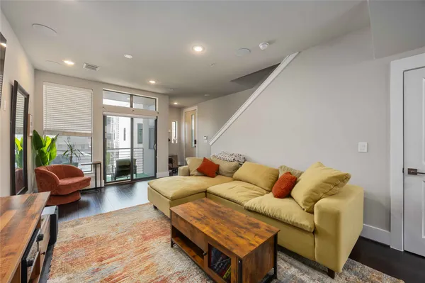 a living room with furniture and a couch
