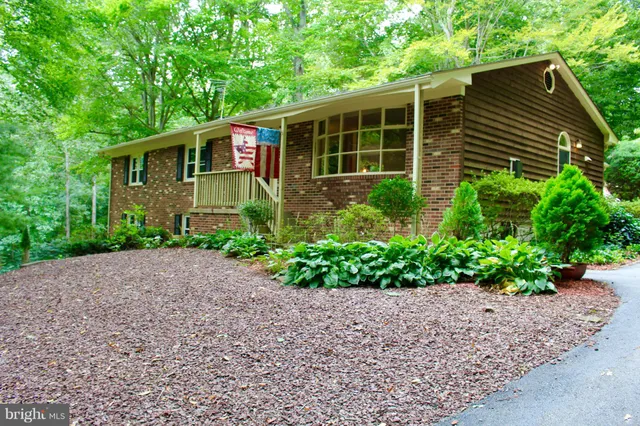 a house that has a lot of plants in it