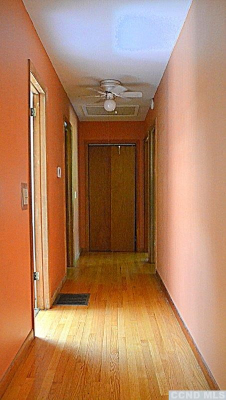 42 Decker Road Claverack, NY 12521 - Photo 8 of 10 an empty room with wooden floor and a bathroom