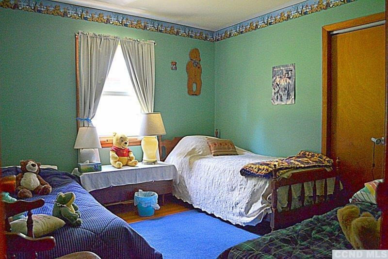 42 Decker Road Claverack, NY 12521 - Photo 9 of 10 a bedroom with a bed and a window
