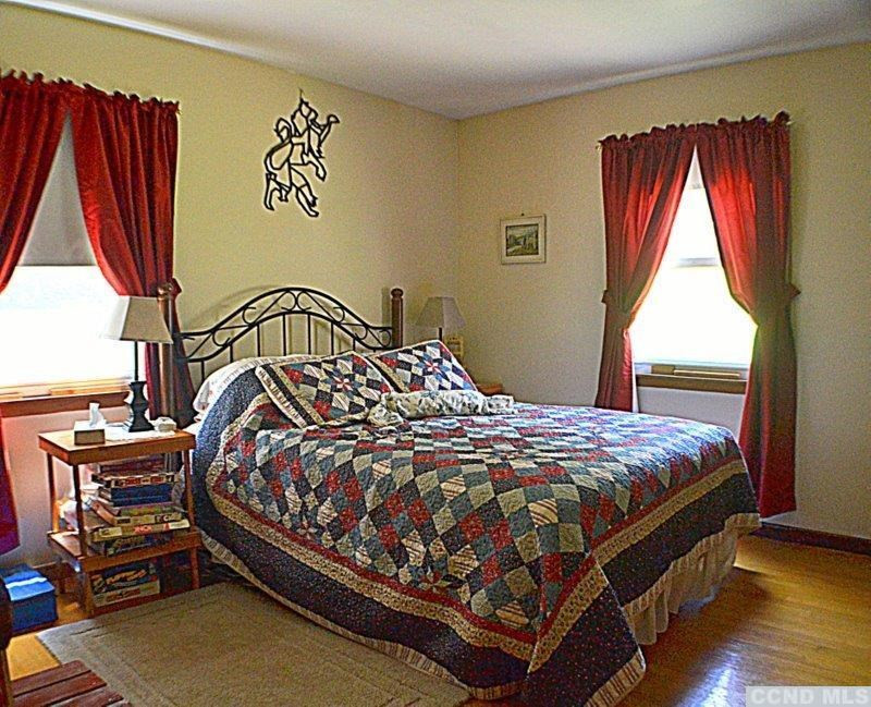 42 Decker Road Claverack, NY 12521 - Photo 10 of 10 a bedroom with a bed and window