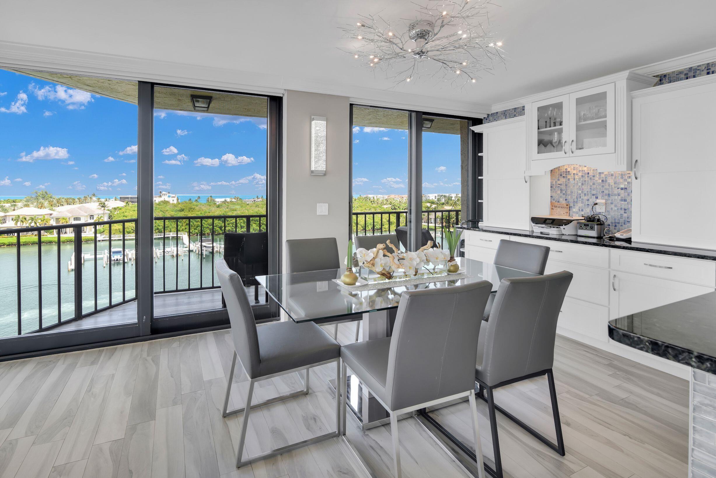 899 Jeffery Street, Unit 714 Boca Raton, FL 33487 - Photo 11 of 51 a view of a dining room with furniture window and outside view