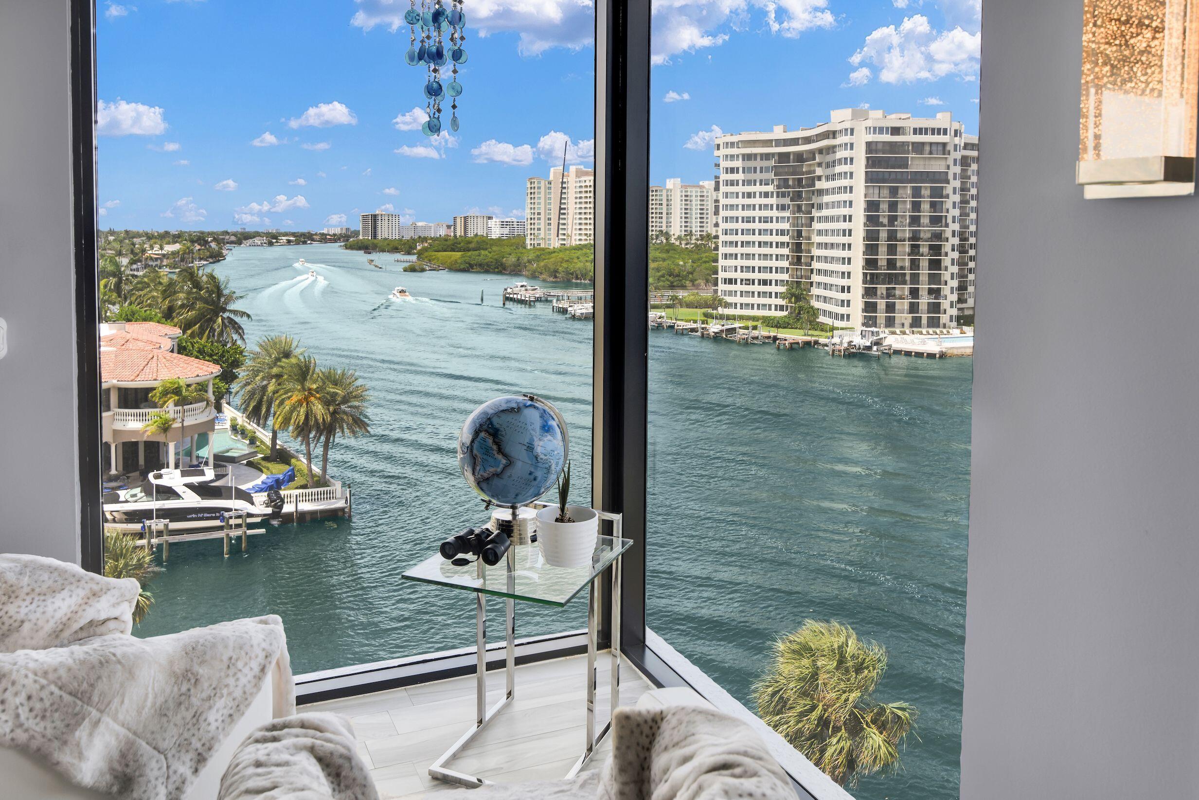 899 Jeffery Street, Unit 714 Boca Raton, FL 33487 - Photo 2 of 51 a view of living room with patio furniture and a floor to ceiling window
