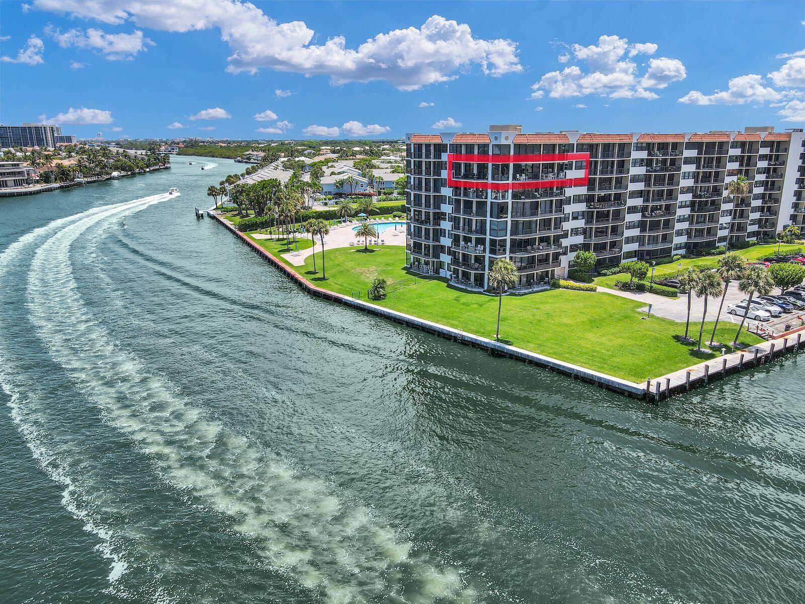 899 Jeffery Street, Unit 714 Boca Raton, FL 33487 - Photo 31 of 51 a view of a swimming pool with an outdoor seating