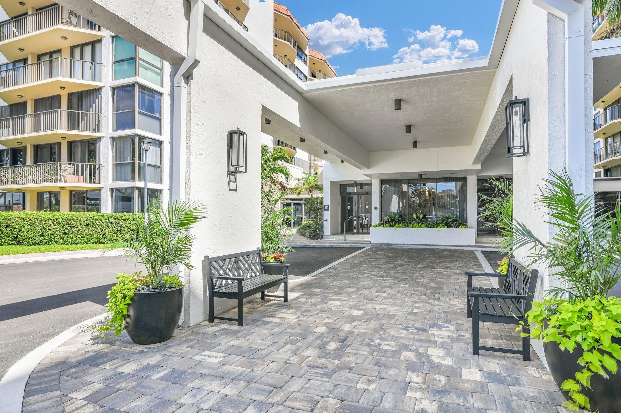 899 Jeffery Street, Unit 714 Boca Raton, FL 33487 - Photo 37 of 51 a view of an house with backyard and sitting area