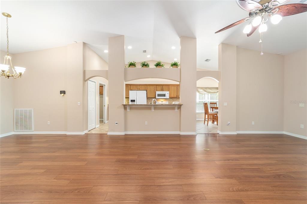 16369 Southwest 14th Avenue Road Ocala, FL 34473 - Photo 9 of 49 a view of an empty room and kitchen view