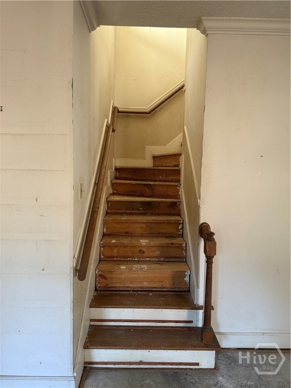302 Gloucester Road Savannah, GA 31410 - Photo 14 of 14 Stairs going up to 5 bedrooms 2 full baths