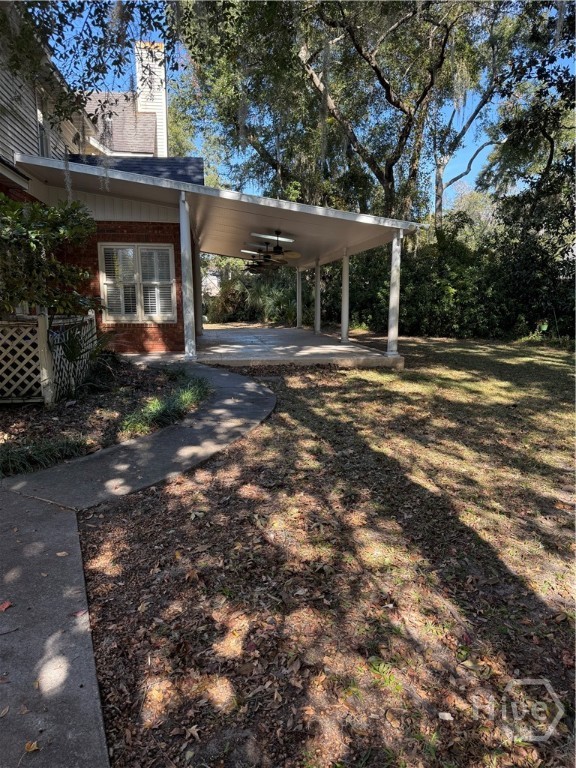 302 Gloucester Road Savannah, GA 31410 - Photo 4 of 14 coming from garage into backyard
