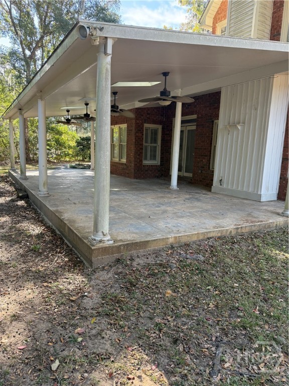 302 Gloucester Road Savannah, GA 31410 - Photo 5 of 14 760 square feet of tile covered porch