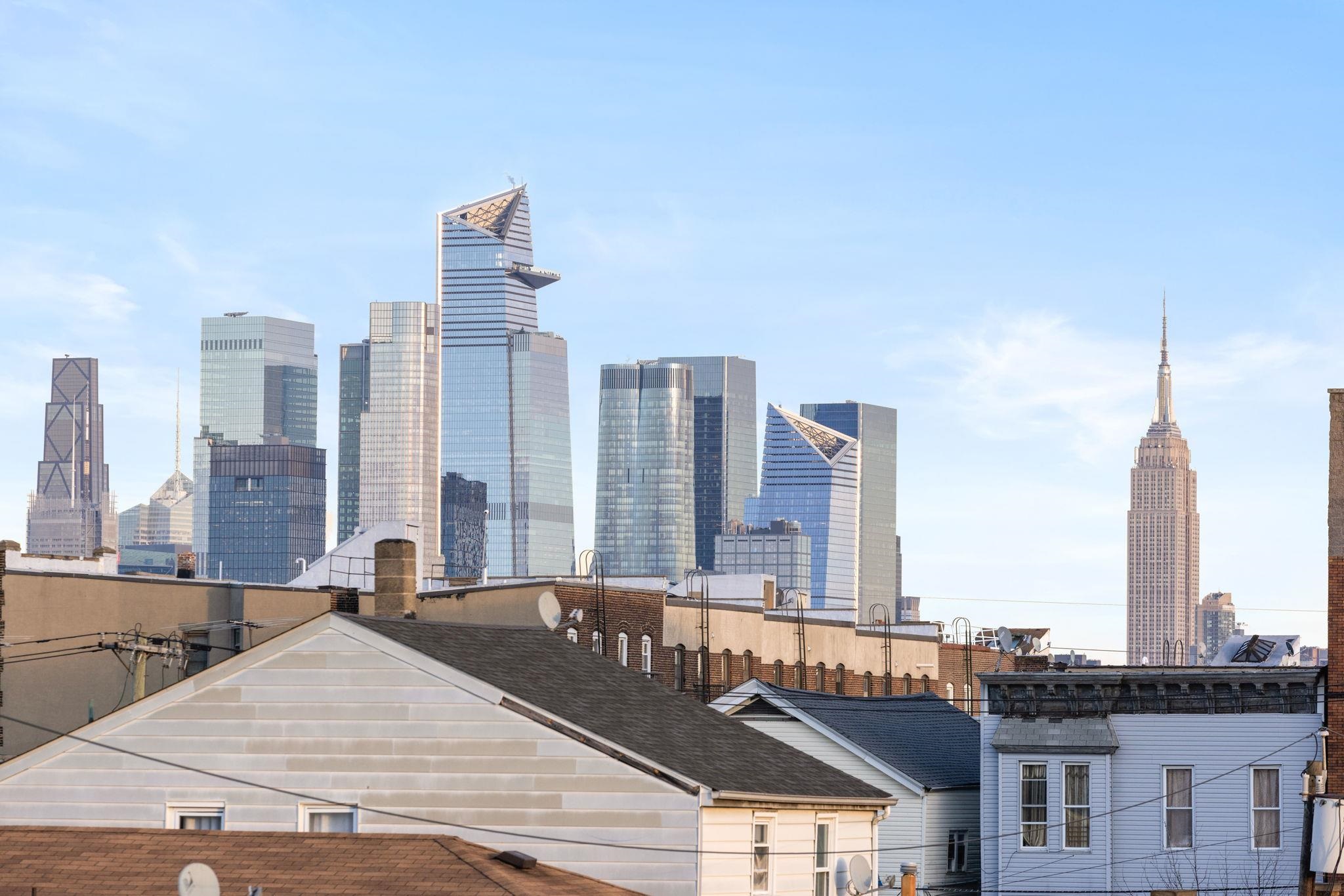 431 7th Street, Unit 2B Union City, NJ 07087 - Photo 14 of 16 a view of city with tall buildings