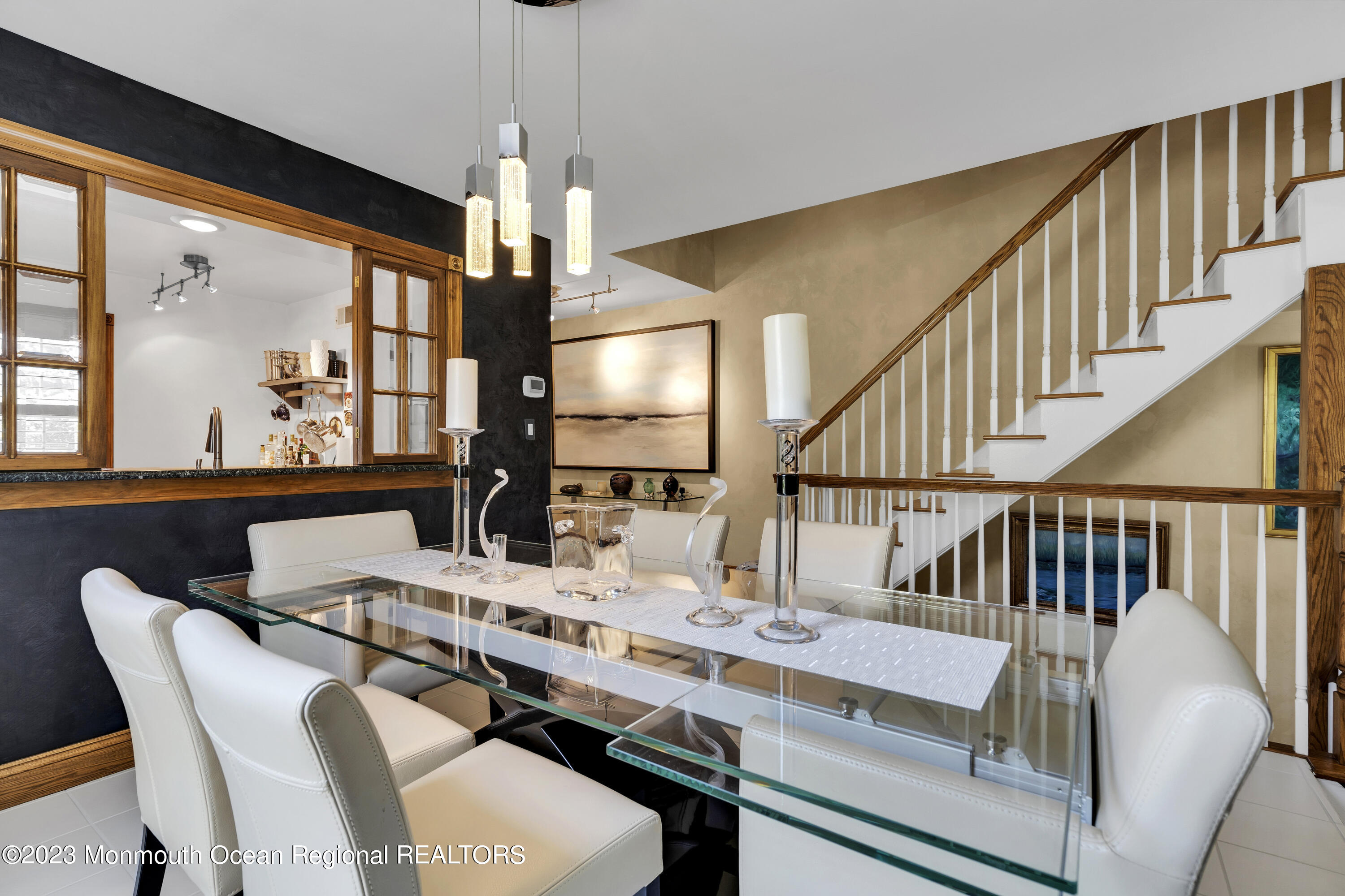 18 Wyckham Road Spring Lake Heights, NJ 07762 - Photo 14 of 74 a dining room with furniture a chandelier and wooden floor