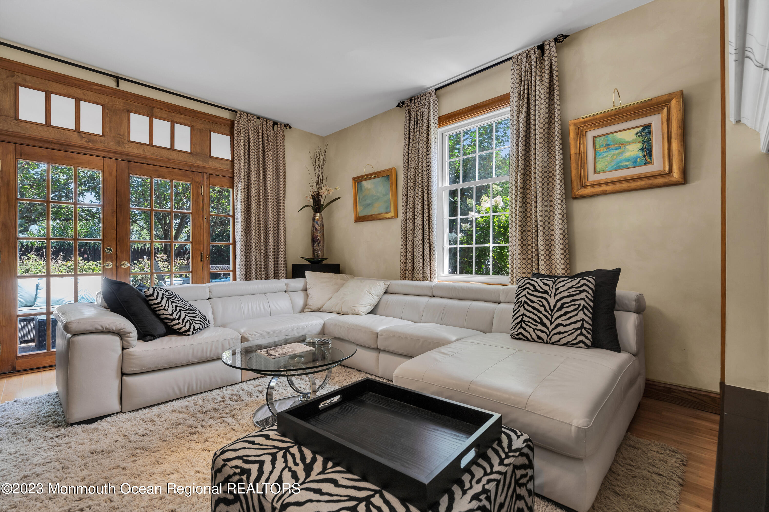 18 Wyckham Road Spring Lake Heights, NJ 07762 - Photo 18 of 74 a living room with furniture and a large window