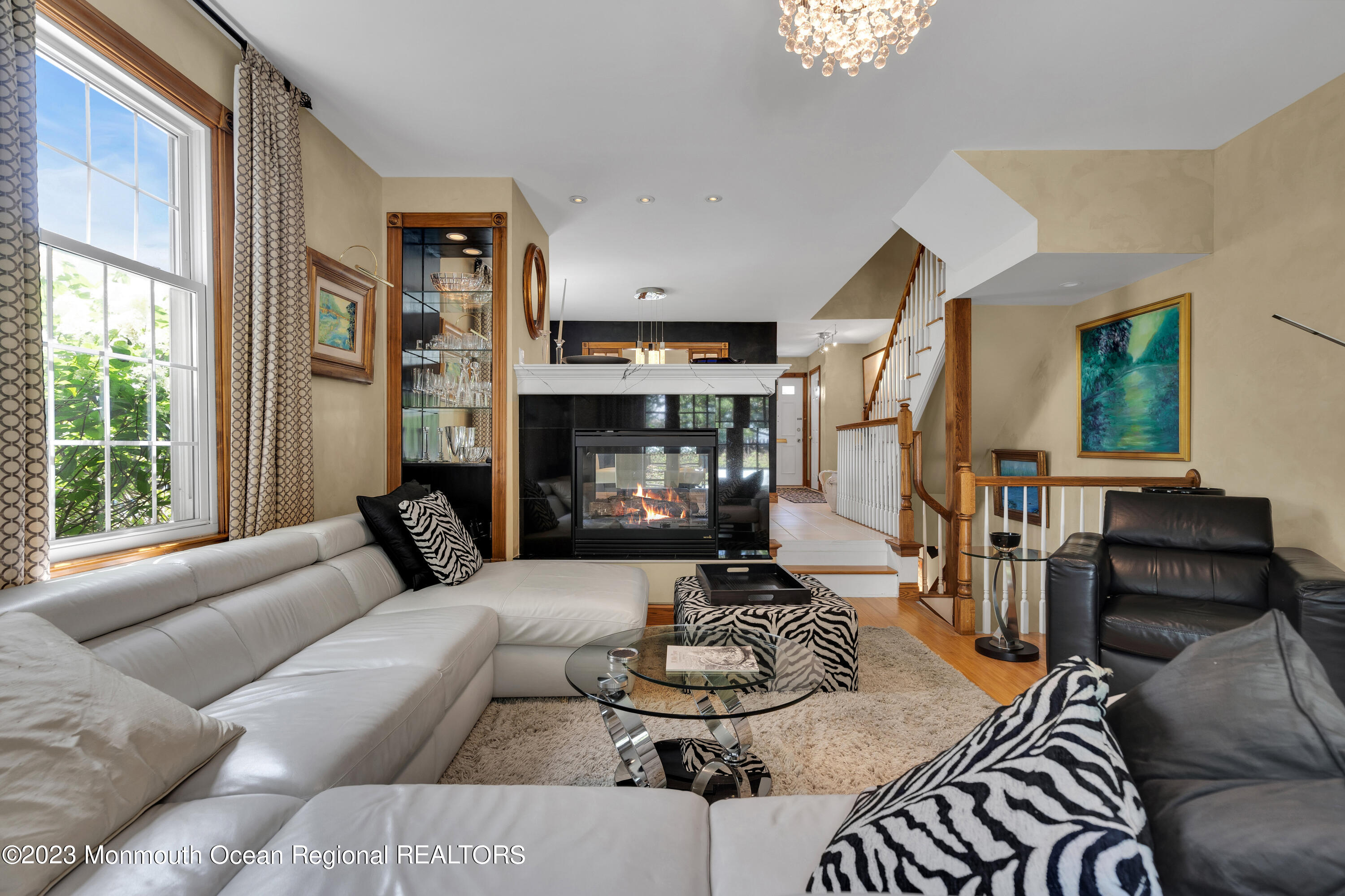 18 Wyckham Road Spring Lake Heights, NJ 07762 - Photo 20 of 74 a living room with furniture and a large window