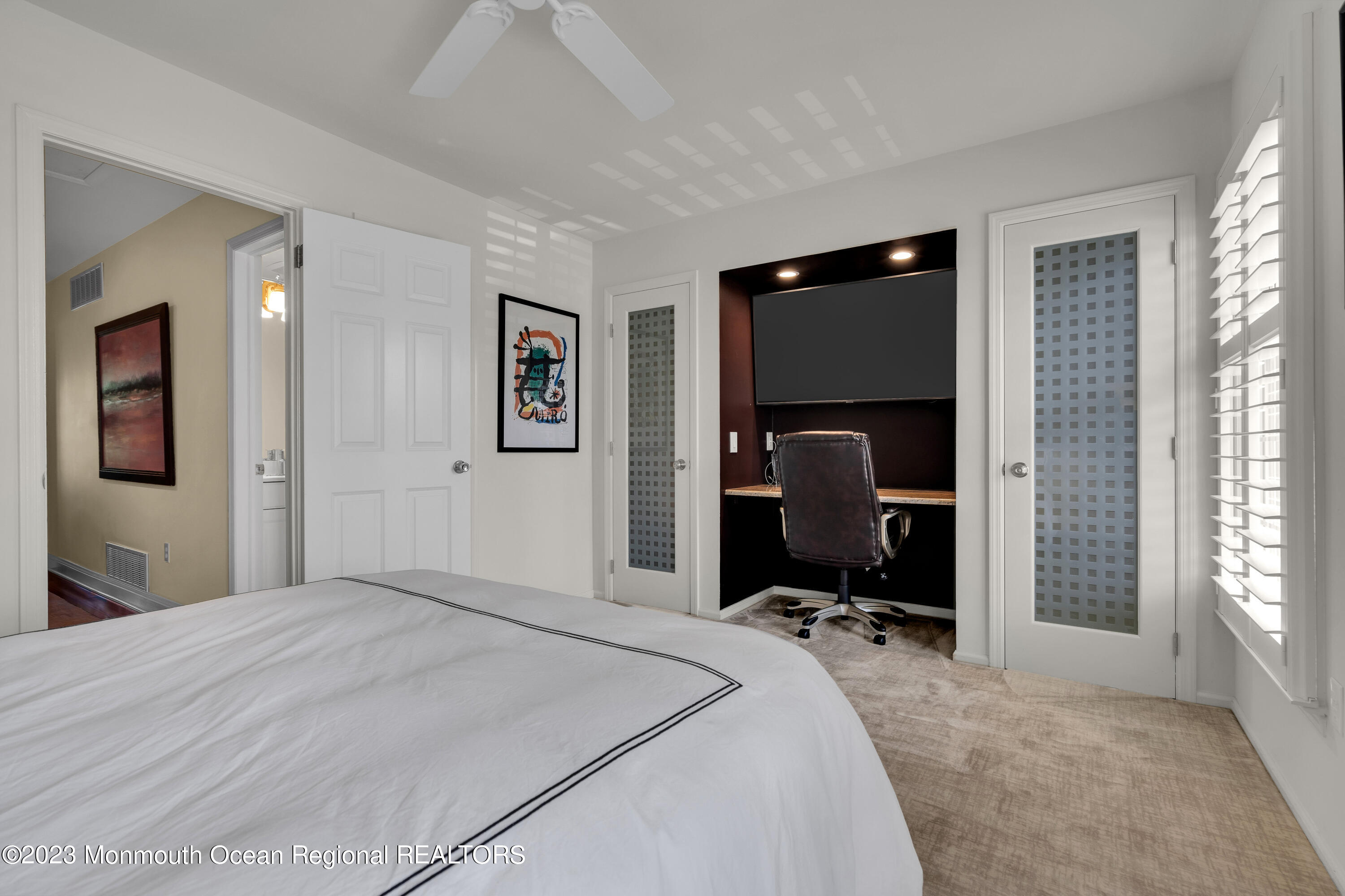 18 Wyckham Road Spring Lake Heights, NJ 07762 - Photo 43 of 74 a bedroom with bed mirror and window