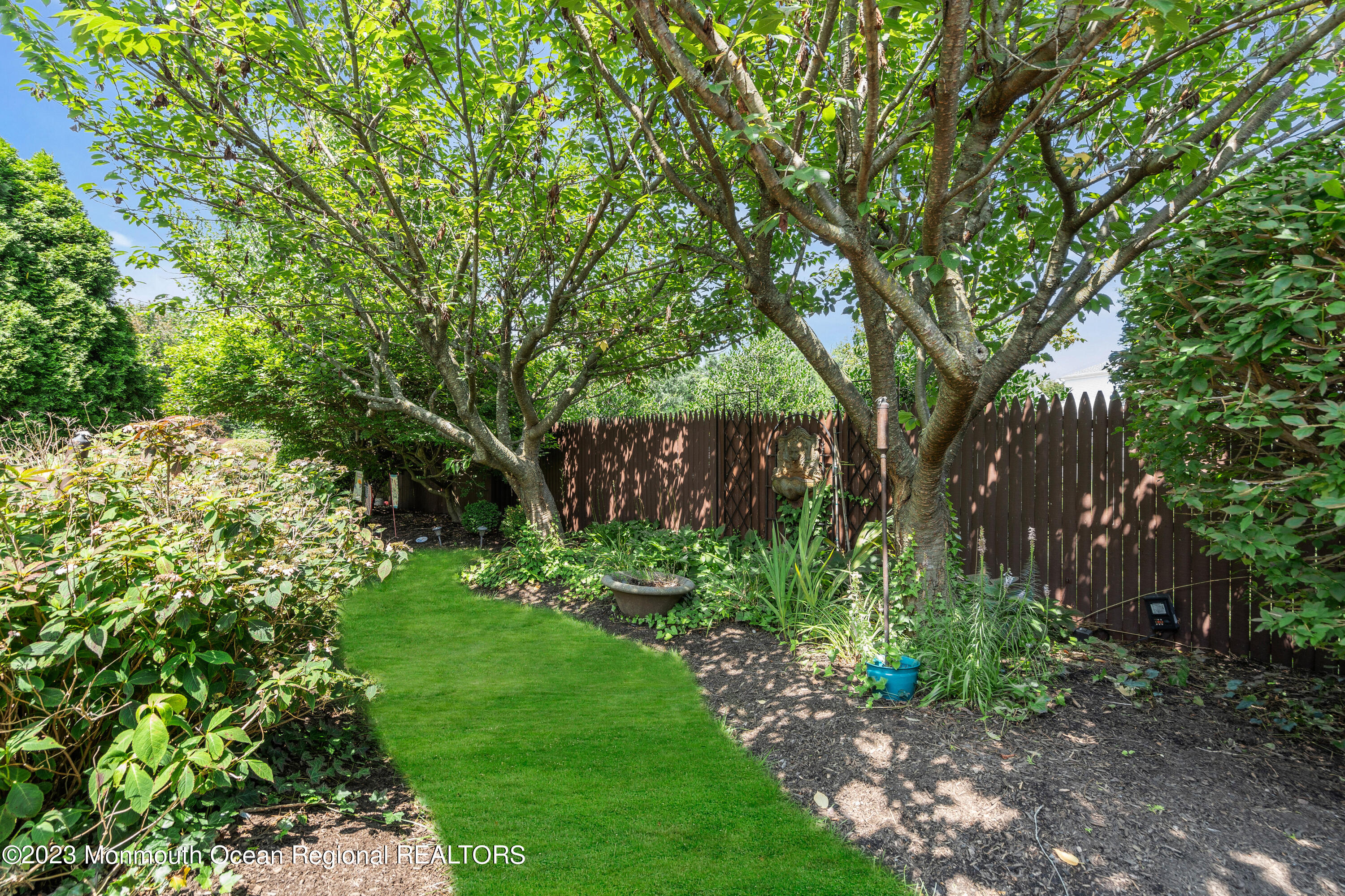 18 Wyckham Road Spring Lake Heights, NJ 07762 - Photo 69 of 74 a view of a garden