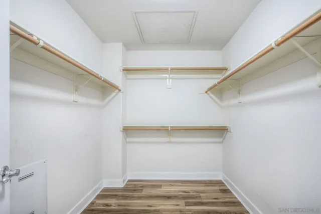 a view of an empty walk in closet